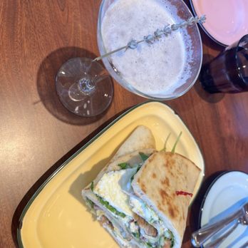 Maple Ridge Grocer - The French 75 mocktail along with the pork belly gyro - Breakfast & Brunch Near Me - Tulsa, Oklahoma