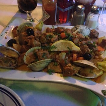 Seabra Marisqueira - Pork cubes with clams and roasted potatoes- no words for how good this was!!! - Portuguese Near Me - Newark, New Jersey Seabra Marisqueira - Pork cubes with clams and roasted potatoes- no words for how good this was!!! - Portuguese Near Me - Newark, New Jersey