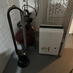 FreeFlow Environmental - The dehumidifier and a fan