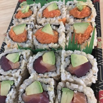 Sushi King Asian Fusion - Spicy tuna roll and Christmas roll. Brown rice substitution. Both rolls were warm. - Sushi Bars Near Me - Columbus, Ohio Sushi King Asian Fusion - Spicy tuna roll and Christmas roll. Brown rice substitution. Both rolls were warm. - Sushi Bars Near Me - Columbus, Ohio