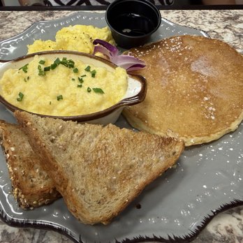 Harvest Kitchen & Bakery - Eggs and grits with a pancake - Breakfast & Brunch Near Me - Katy, Texas Harvest Kitchen & Bakery - Eggs and grits with a pancake - Breakfast & Brunch Near Me - Katy, Texas