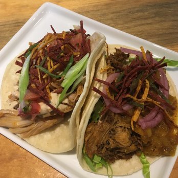 Taps & Tacos - Vegan jerkfruit taco on the left (subbed pico de gallo for the tropical salsa), and coffee-spiced pork on the right. - Beer Bar Near Me - Port Moody, British Columbia Taps & Tacos - Vegan jerkfruit taco on the left (subbed pico de gallo for the tropical salsa), and coffee-spiced pork on the right. - Beer Bar Near Me - Port Moody, British Columbia