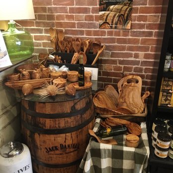 Olive Amelia - a display of olivetta and wooden utensils - Olive Oil Near Me - Amelia Island, Florida Olive Amelia - a display of olivetta and wooden utensils - Olive Oil Near Me - Amelia Island, Florida