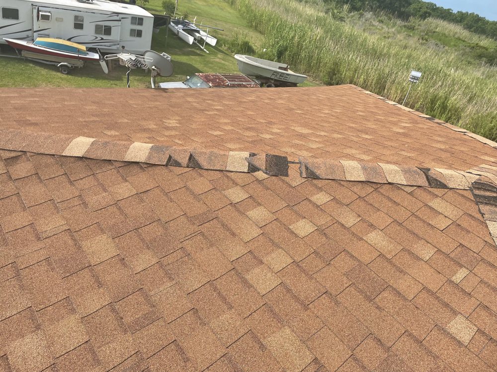 Slide of Restoration Roofing & Remodeling