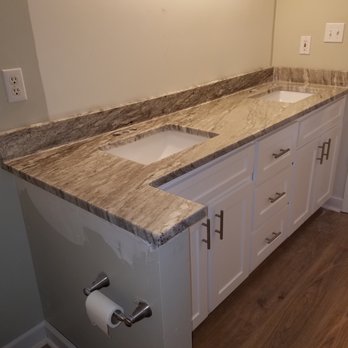 Diamond Stone Works - Photo immediately after the installation.   It'll be doubly AMAZING after the faucets, mirror and new paint are completed!!!! - Countertop Installation Near Me - Virginia Beach, Virginia