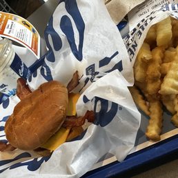 Single bacon burger, fries and heath concrete.