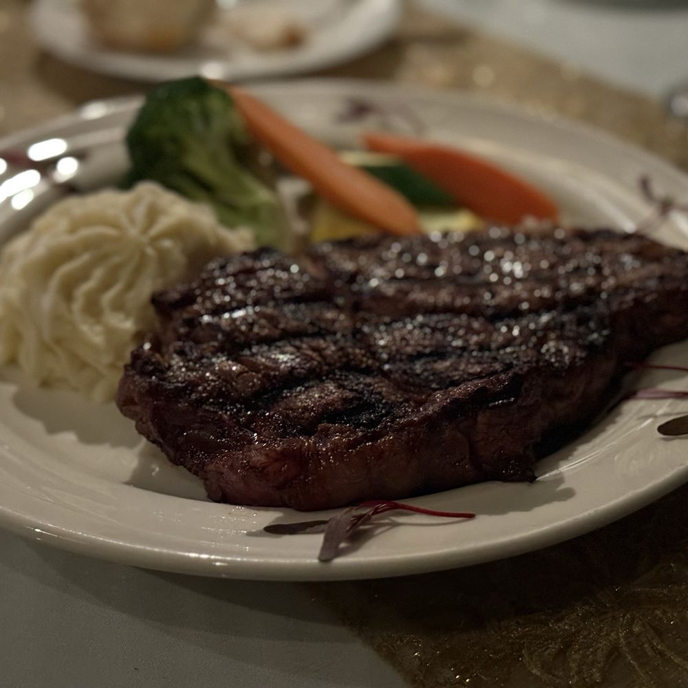 Glen Eagle's Restaurant & Lounge - Ribeye, garlic mashed potatoes and steamed vegetables - American Near Me - Carson City, Nevada Glen Eagle's Restaurant & Lounge - Ribeye, garlic mashed potatoes and steamed vegetables - American Near Me - Carson City, Nevada