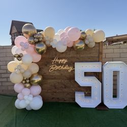 Have Fun Events - Wooden backdrop, HBD led sign, marquee 50, balloon garland
