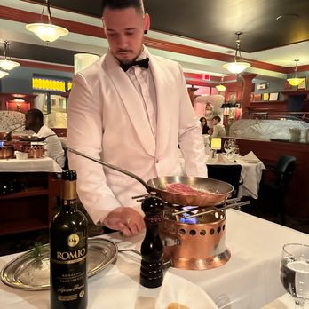 Le Continental - A hunky waiter cooking my husbands steak - French Near Me - Quebec City, Quebec Le Continental - A hunky waiter cooking my husbands steak - French Near Me - Quebec City, Quebec