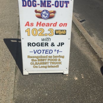 Dog Me Out - a sign on the side of the road - Hot Dogs Near Me - Patchogue, New York