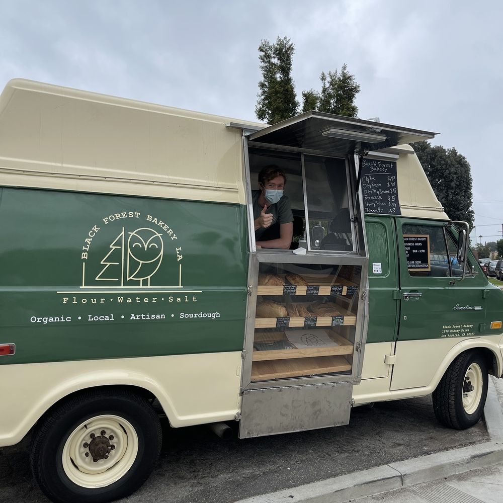 a food truck parked on the side of the road