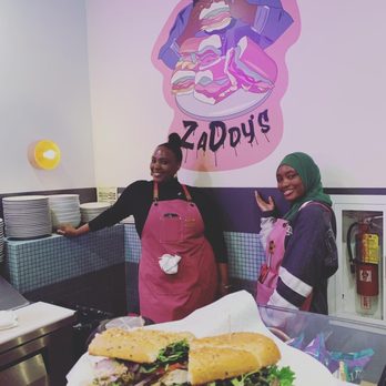 Zaddy’s - Owner Chef Aliah with a staffer and the Chicken Avocado Sandwich at Zaddy's Sandwiches in Atlanta - Salad Near Me - Atlanta, Georgia Zaddy’s - Owner Chef Aliah with a staffer and the Chicken Avocado Sandwich at Zaddy's Sandwiches in Atlanta - Salad Near Me - Atlanta, Georgia