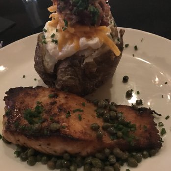 Stoney River - Salmon w/ Loaded Baked Potato. Salmon looks more done than in the past. Was still pretty good. - Steakhouses Near Me - Louisville, Kentucky Stoney River - Salmon w/ Loaded Baked Potato. Salmon looks more done than in the past. Was still pretty good. - Steakhouses Near Me - Louisville, Kentucky