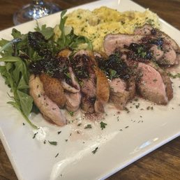 Roasted Duck , blueberry pan sauce arugula and roasted potatoes... OMG deliciousness on a plate. Roasted Duck , blueberry pan sauce arugula and roasted potatoes... OMG deliciousness on a plate.