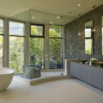 Lori Dennis - Modern Bathroom, Limestone Floors, Lava Rock Wall& Steam Shower. Pamper yourself.  Contact us to make it yours. http://www.loridennis.com/ - Interior Design Near Me - Los Angeles, California