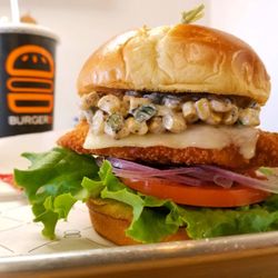 A's Chicken Sandos & Wings - Southwest style. Chicken, Pepper Jack Cheese, Lettuce, Tomato, Avocado, Elote Salad.