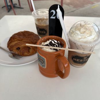 Hester's Cafe & Coffee Bar - Six Points - Double espresso, Chi Tea Ice, Latte and Chocolate croissant... - Coffee & Tea Near Me - Corpus Christi, Texas Hester's Cafe & Coffee Bar - Six Points - Double espresso, Chi Tea Ice, Latte and Chocolate croissant... - Coffee & Tea Near Me - Corpus Christi, Texas