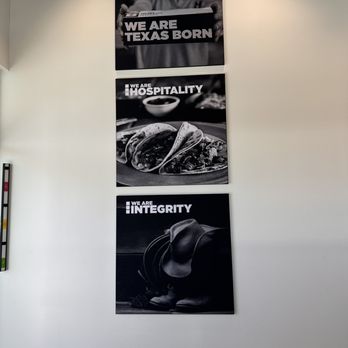 TXB - three black and white posters on a wall - Gas Stations Near Me - Kyle, Texas