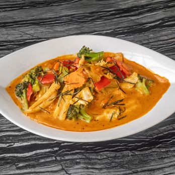 Kay Thai Eatery - Emperor Salmon - Freshly grilled salmon topped with mixed vegetables in curry sauce - Thai Near Me - Fairfield, Connecticut