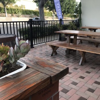 Lightning Brewery - tables and benches on a brick patio - Breweries Near Me - Poway, California