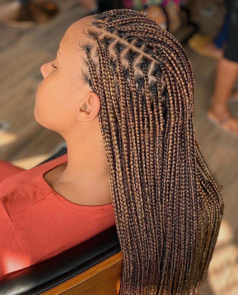 Africa braiding by Blanche Logo
