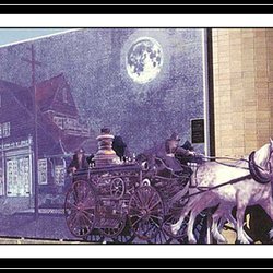 Last Resort Fire Department - West Seattle Mural 1988  "Midnight Run" - Steam pumper and horses a cutout  located in front of painted Firehouse # 32 mural painting.