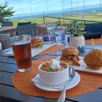 Big Sur Adventures - Lunch at Sticks at Spanish Bay looking toward the 1st hole fairway. - Bike Rentals Near Me - Pacific Grove, California