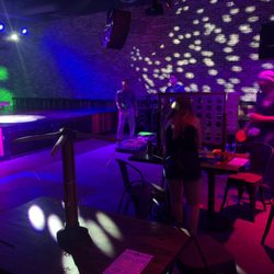 The Green Room - Band stage, ring toss, connect 4. Jenga. Corn hole
