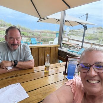 Beachcomber Restaurant - Our spot outside with covered umbrella - Seafood Near Me - Saint Augustine, Florida