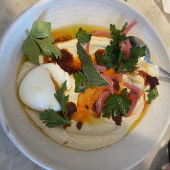 Avec River North - chickpea hummus with a soft egg, smoked almond harissa, pickled red onions (comes with hearth baked pita) - Mediterranean Near Me - Chicago, Illinois