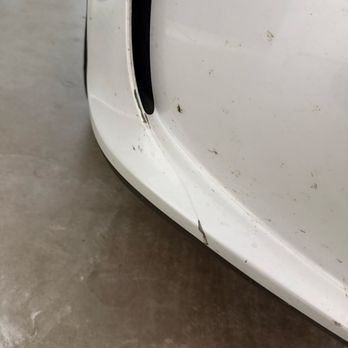 Tint World - Shows the PPF peeling on the bumper. There is mud between the PPF and the paint. - Car Window Tinting Near Me - Spring, Texas Tint World - Shows the PPF peeling on the bumper. There is mud between the PPF and the paint. - Car Window Tinting Near Me - Spring, Texas