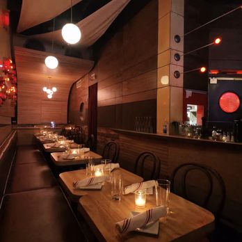 Amélie west village Restaurant, Bistro & Wine Bar - One of the tables we sat at. - French Near Me - New York, New York