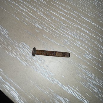 City Home - A rusted screw that fell out of our brand new table - Furniture Stores Near Me - Wellington, Florida