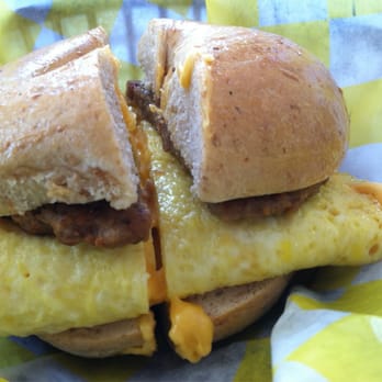 NY Bagel - Egg, sausage and cheese breakfast sandwich on a whole wheat bagel - Bagels Near Me - Houma, Louisiana