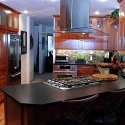 Cascade Kitchens - New custom cherry cabinets with island hood