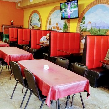 Los Amigos Restaurant - tables and booths with red tablecloths - Mexican Near Me - La Feria, Texas Los Amigos Restaurant - tables and booths with red tablecloths - Mexican Near Me - La Feria, Texas
