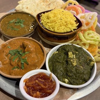 Curry Up Now - The American Punjabi Thali w/naan bread, rice, fryums, Saag Paneer, mango chutney, butter chicken and Daal - Indian Near Me - Flower Mound, Texas Curry Up Now - The American Punjabi Thali w/naan bread, rice, fryums, Saag Paneer, mango chutney, butter chicken and Daal - Indian Near Me - Flower Mound, Texas