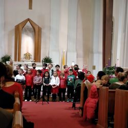 Holy Cross Church - Rehearsal for the Children's Christmas concert! My grandson is making a heart shape! #holycrosschurch @yelpdc #christmas