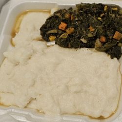 Sambosa Restuarant - Grits and greens with the goat