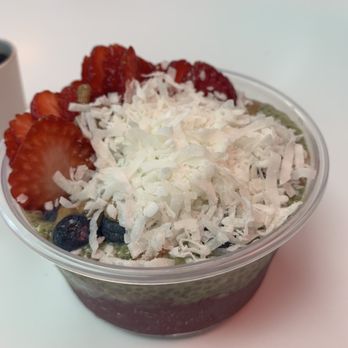 Acai Joint - Baldwin Park - Acai bowl with acai base, matcha pudding, sweetened coconut flakes, strawberries, blueberries and almond butter. - Acai Bowls Near Me - Baldwin Park, California Acai Joint - Baldwin Park - Acai bowl with acai base, matcha pudding, sweetened coconut flakes, strawberries, blueberries and almond butter. - Acai Bowls Near Me - Baldwin Park, California