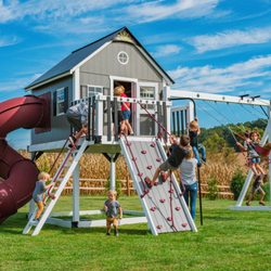 King Swings - This massive playhouse is packed full of fun features!