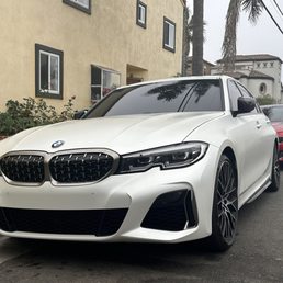 Full white pearl wrap, and tint job