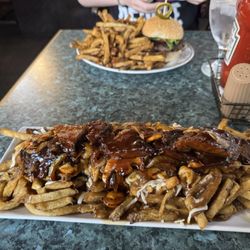 La Rocque Dining - Brisket poutine and burger with fries.
