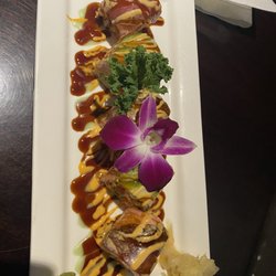 Ginza Japanese Restaurant - This is a delicious dinner the sexy mama roll we had tonkusu and the Salmon Teriyaki Bento Box it was delicious!! We highly recommend it.