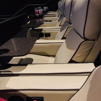 AMC DINE-IN Clearfork 8 - Luxury recliners with 2 lower-back heater settings. Click the button to Red or Yellow. - Cinema Near Me - Fort Worth, Texas