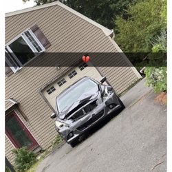 Nelcon Towing and Recovery - Front of my sons car when returned