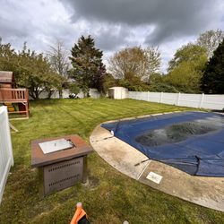Stewarts Landscaping - mowing and edging around pool