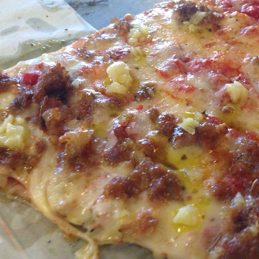 Naples Pizza - Sausage garlic slice. Gotta love it - Pizza Near Me - Farmington, Connecticut