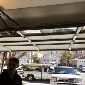 Valencia Overhead Door - Cody getting ready to repair this door - Garage Door Services Near Me - Santa Clarita, California Valencia Overhead Door - Cody getting ready to repair this door - Garage Door Services Near Me - Santa Clarita, California