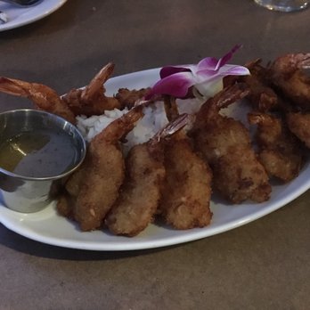 Gladstone's - Golden Fried Coconut Shrimp w/ a Pineapple Plum Sauce - Seafood Near Me - Long Beach, California Gladstone's - Golden Fried Coconut Shrimp w/ a Pineapple Plum Sauce - Seafood Near Me - Long Beach, California